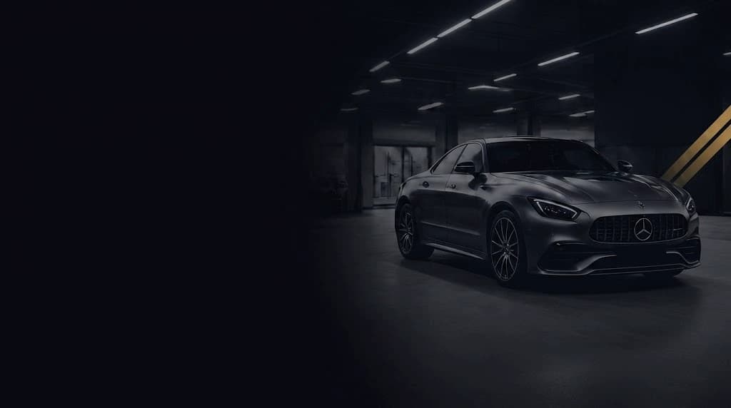 Land Rover AMG GT in a dark showroom