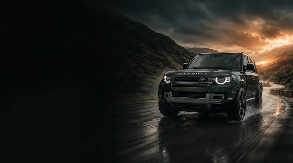 Land Rover-AMG driving through the city at night